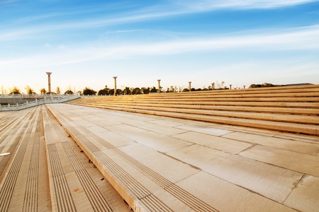 Panoramic skyline and buildings with empty concrete square floorの写真素材