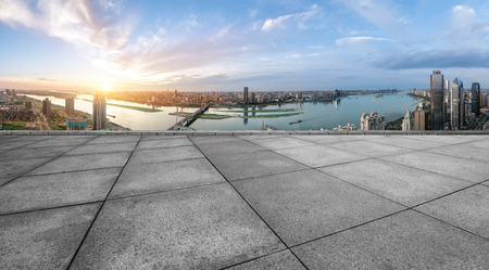 cityscape and skyline of hangzhou new city in cloud sky on view from marble floorの写真素材