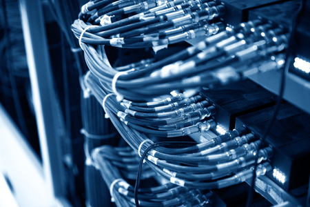 Network panel, switch and cable in data centerの写真素材
