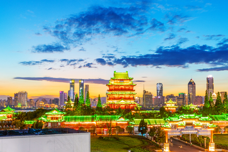 The combination of urban architecture and old architecture in Nanchang, China (the Chinese character in the ancient building is Tengwang Pavilion)の写真素材