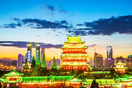 The combination of urban architecture and old architecture in Nanchang, China (the Chinese character in the ancient building is Tengwang Pavilion)の写真素材