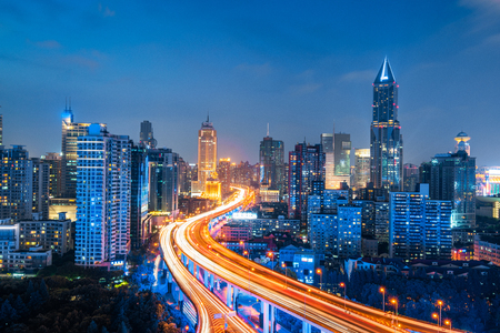 shanghai elevated road junction and interchange overpass at nightの写真素材
