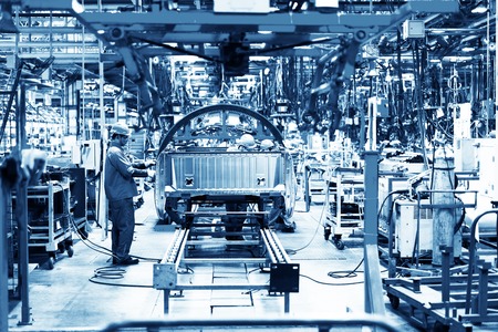 Welding robots movement in a car factory