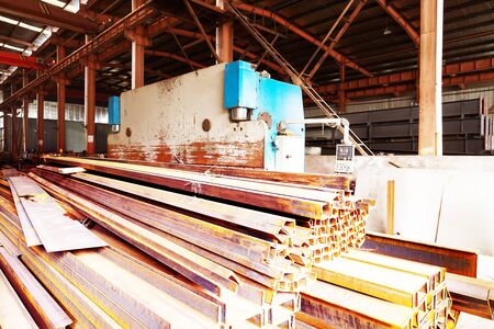 The interior of a big industrial building or factory with steel constructionsの写真素材