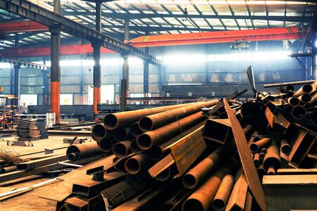 The interior of a big industrial building or factory with steel constructionsの写真素材