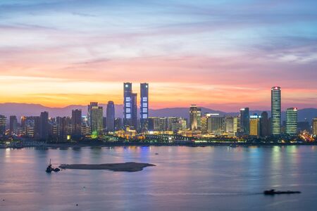 modern high-rise buildings line the new honggutan district in nanchang, jiangxi province.