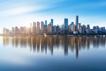 Landscape of downtown near water in blue skyの写真素材