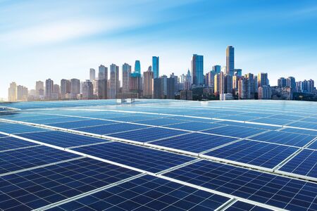 Photovoltaic and modern city skyline, China Chongqing.の写真素材