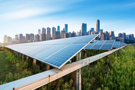 Photovoltaic and modern city skyline, China Chongqing.の写真素材