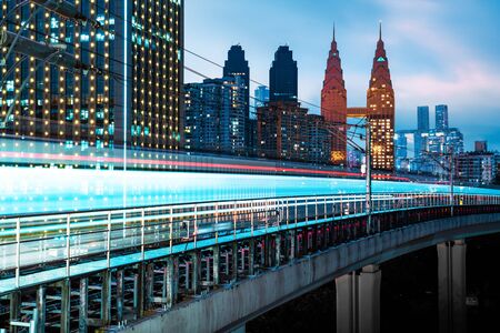 subway train with skyscraper in the modern city, in Chongqing, china.の写真素材