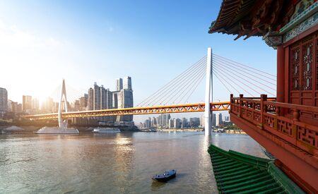 cityscape and skyline of downtown near water of chongqing at nightの写真素材