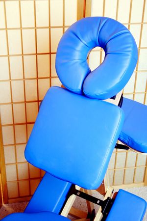 Blue  chair in front of a paraventの写真素材