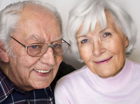 Happy senior couple smiling for a portrait の写真素材
