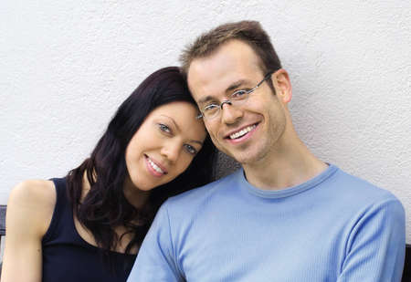  Young couple portrait, smiling  at camera and happy together