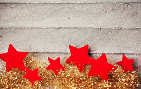 Red stars on wooden backgroundの写真素材
