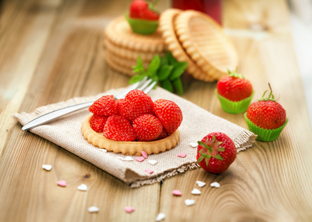 Strawberry biscuit on wooden backgroundの写真素材