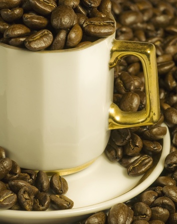 Coffee beans in cupの写真素材