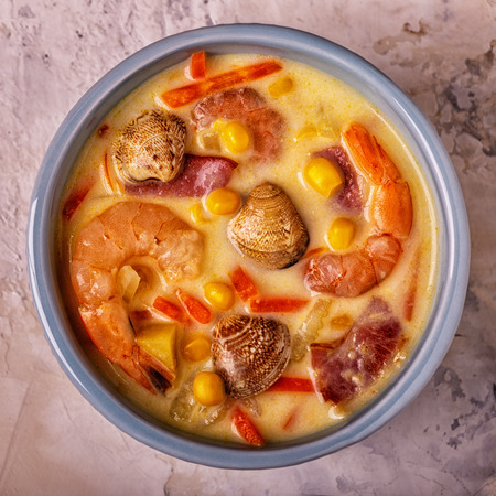 Homemade clam chowder with shrimps, top view.の写真素材