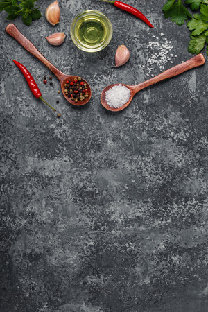 Background with spices, herbs and olive oil, top view, copy space.の写真素材