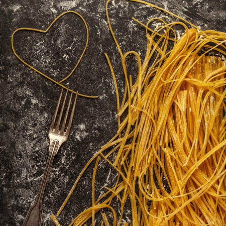 Fresh homemade pasta, spaghetti, top view.の写真素材