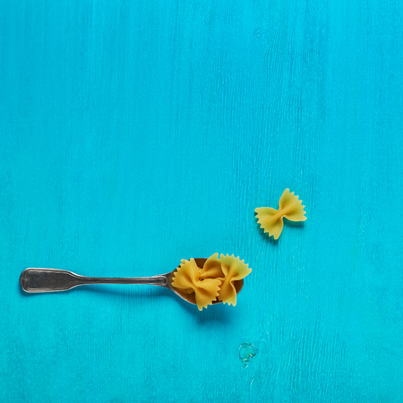 Concept of food, pasta on a blue background, top view, banner.の写真素材