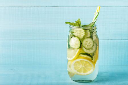 Detox fruit infused water. Refreshing summer homemade cocktail, selective focus.の写真素材