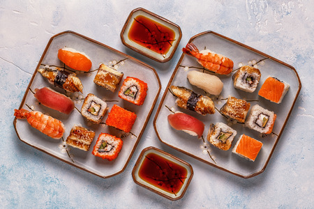 Sushi Set: sushi and sushi rolls on plate, top view.の写真素材