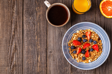Delicious breakfast on a rustic table. Top view, copy space.の写真素材