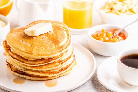 Delicious homemade breakfast with pancakes, selective focus.