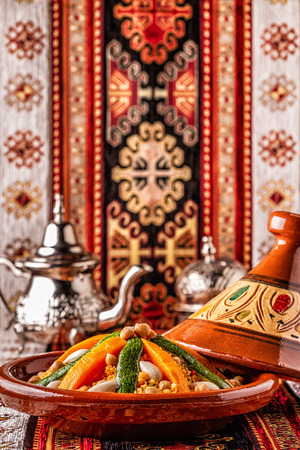 Vegetable tagine with almond and chickpea couscous, selective focus.の写真素材