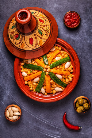 Vegetable tagine with almond and chickpea couscous, top view.の写真素材