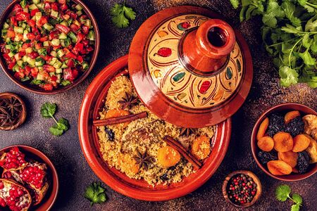 Traditional moroccan tajine of chicken with dried fruits and spices, top view.の写真素材