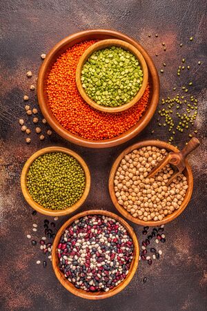 Assortment  of Legumes - lentils, peas, mung, chickpeas and different beans. Top view.の写真素材