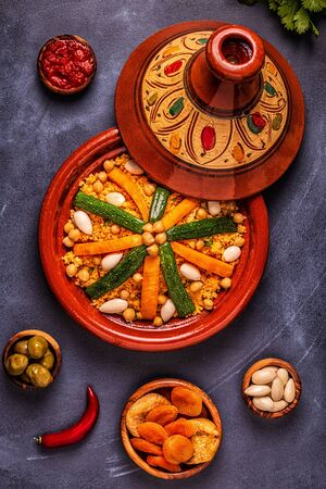 Vegetable tagine with almond and chickpea couscous, top view.の写真素材