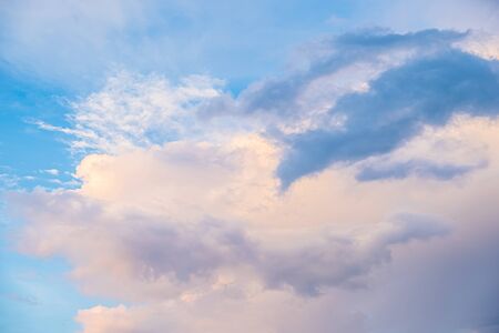 Beautiful evening sky with clouds, abstract blurred background.