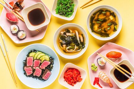 Table with traditional japanese food, top view.の写真素材