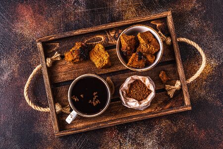 Chaga tea - a strong antioxidant, boosts immune system, has detox quality, improves digestive.の写真素材