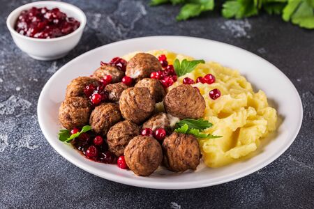 Homemade Swedish Meatballs with Cream Sauce and Parsley, Selective focuseの写真素材