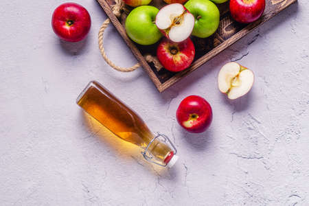Apple cider vinegar or fermented fruit drink, top view.の写真素材