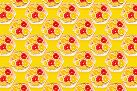 Pattern tropical fruits whole and slices on plates