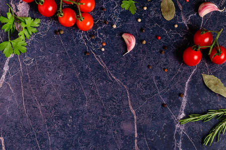 Food background - fresh vegetables and various spices. Cooking concept. Top view.