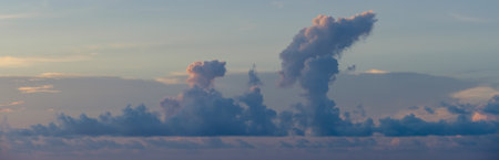 Beautiful colored cloudy evening sky. Sky with clouds at sunset. Abstract sky background.