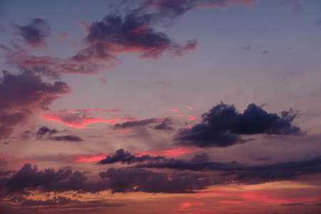 Beautiful colored cloudy evening sky. Sky with clouds at sunset. Abstract sky background.