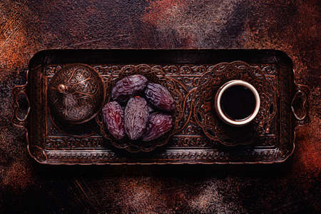 Dried dates fruit with Turkish coffee. Popular fruit of Ramadan.