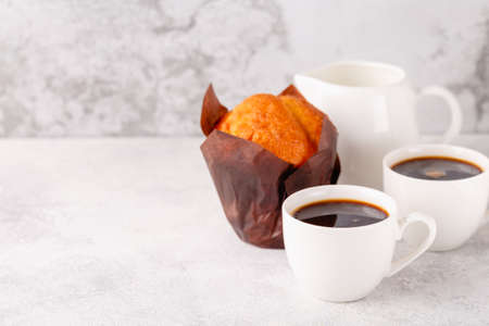 Hot coffee and muffin, selective focus.の写真素材