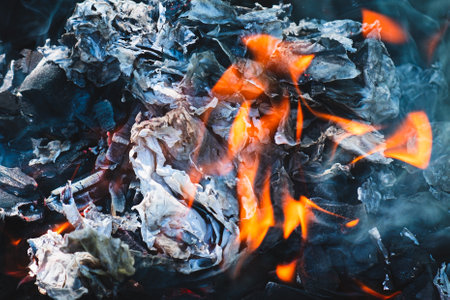 Background with burning paper and coal.の写真素材