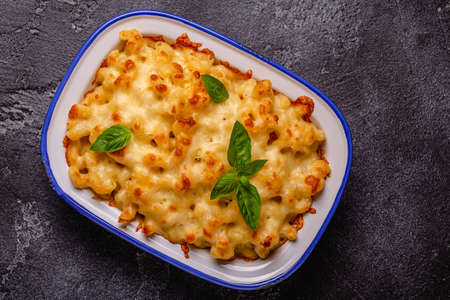 American mac and cheese, macaroni pasta in cheesy sauce. top view.の写真素材