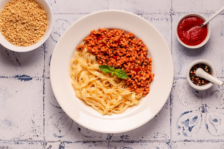 Vegan Bolognese Pasta with plant based minced meat, top view.の写真素材