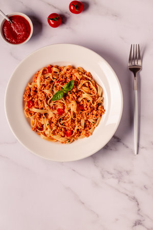 Vegan Bolognese Pasta with plant based minced meat, top view.の写真素材