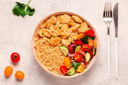 Bowl of quinoa with vegan meat and vegetables, top view.の写真素材